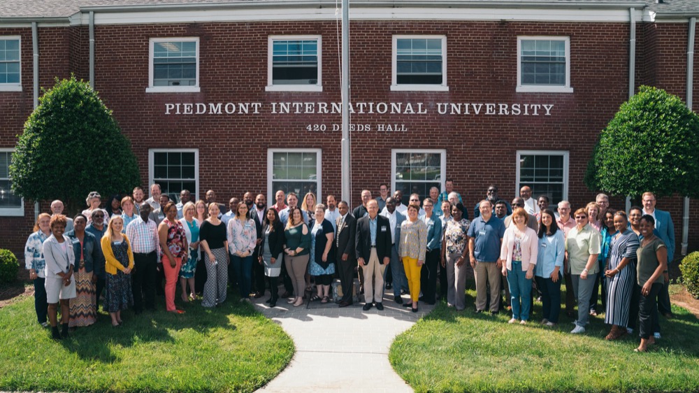 PhD students gathered outside Deeds Hall